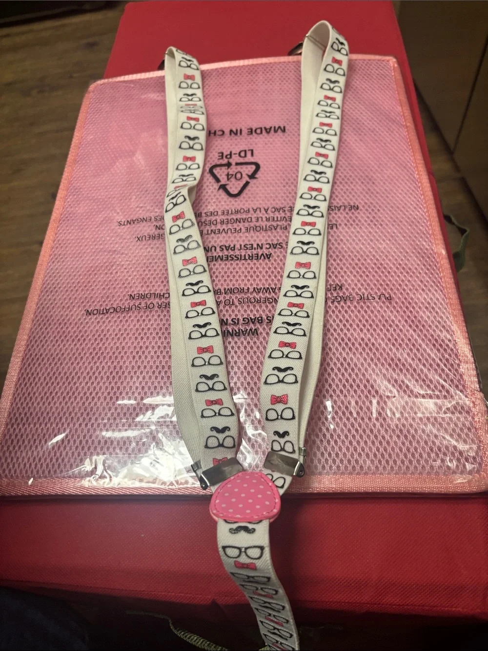 White Novelty Suspenders with Pink glasses ,bow tie and mustache Accent